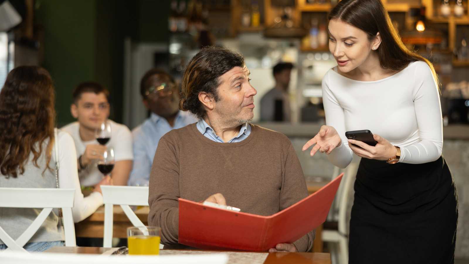telltale signs fine dining servers use to judge you the second you walk in