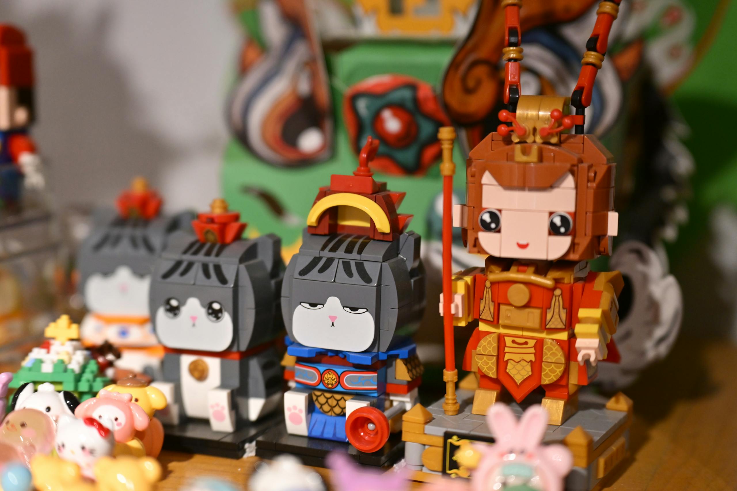 Vibrant display of whimsical toy figurines including animal and warrior themes.