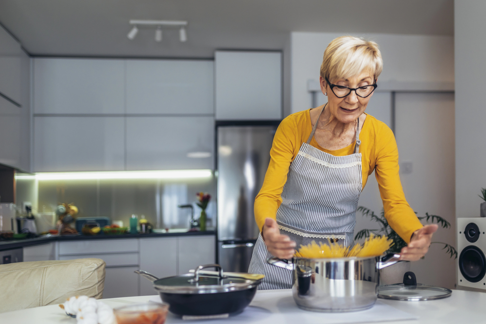 senior woman cooking