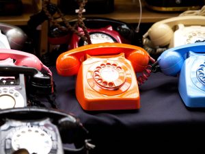 old retro red and blue plastic telephone