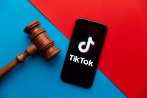 Tula, Russia - September 08, 2020: Tik Tok logo on iPhone display