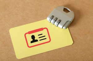 Privacy Protection and Data Security Symbolized with Lock and ID Badge