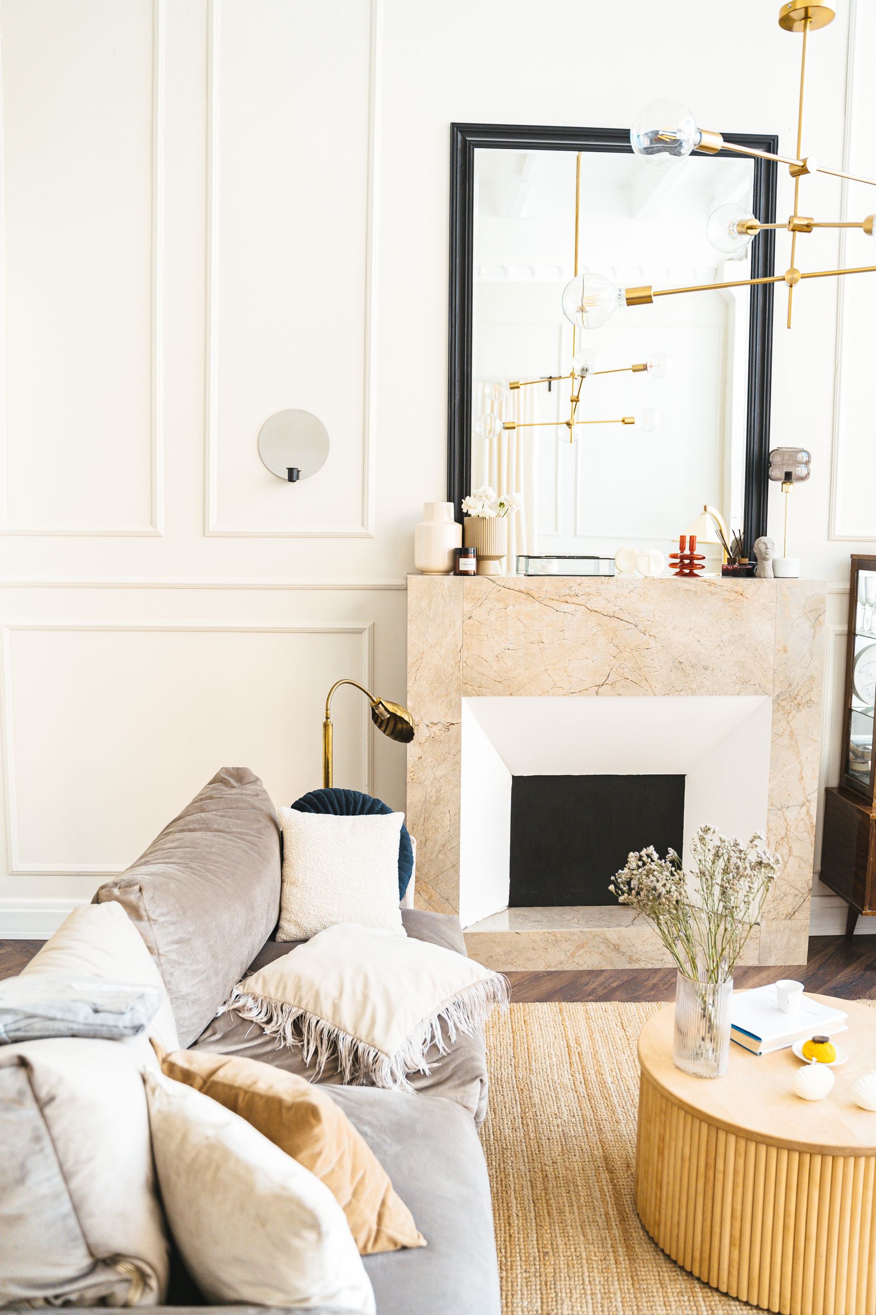A stylish and cozy living room featuring contemporary design elements and warm decor.
