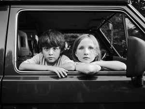black-and-white-childhood-road-trip-portrait-