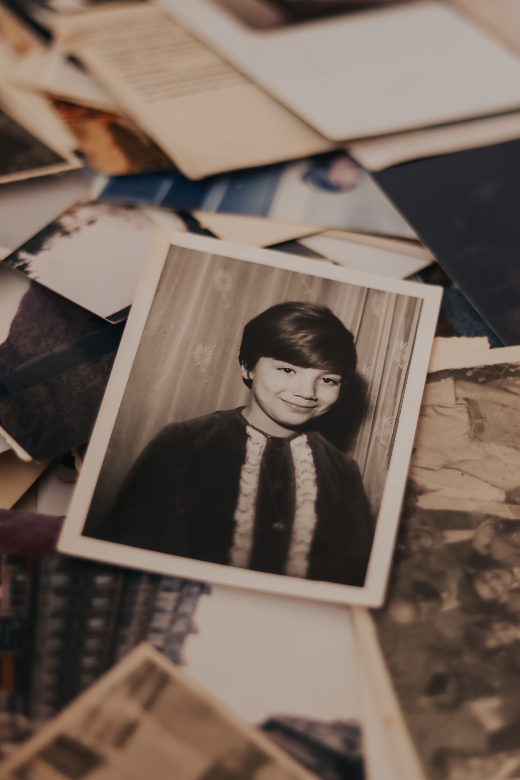 A nostalgic collection of vintage black and white childhood photographs.